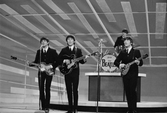NEW YORK - FEBRUARY 9: The Beatles perform during their first appearance on THE ED SULLIVAN SHOW, February 9, 1964. From left: Paul McCartney, George Harrison, Ringo Starr, and John Lennon. (Photo by CBS via Getty Images)